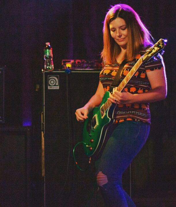 Alli Playing Guitar